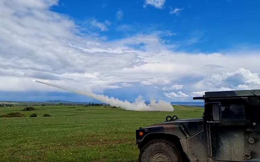 In this screenshot, a rocket is fired at Grafenwoehr Training Area, Germany, May 19, 2021, during Dynamic Front 21, a multinational exercise led by the U.S. Army's 41st Field Artillery Brigade. 