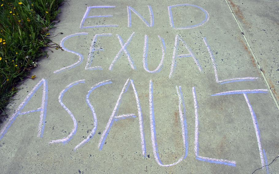 An anti-sexual assault message is written on a sidewalk at Fort Detrick, Md., in 2021. An Army-commissioned study released Feb. 27, 2023, recommended that commanders be briefed on how the variety of sexual assaults occurring in the Army differ from those of college campuses, despite similar demographics.