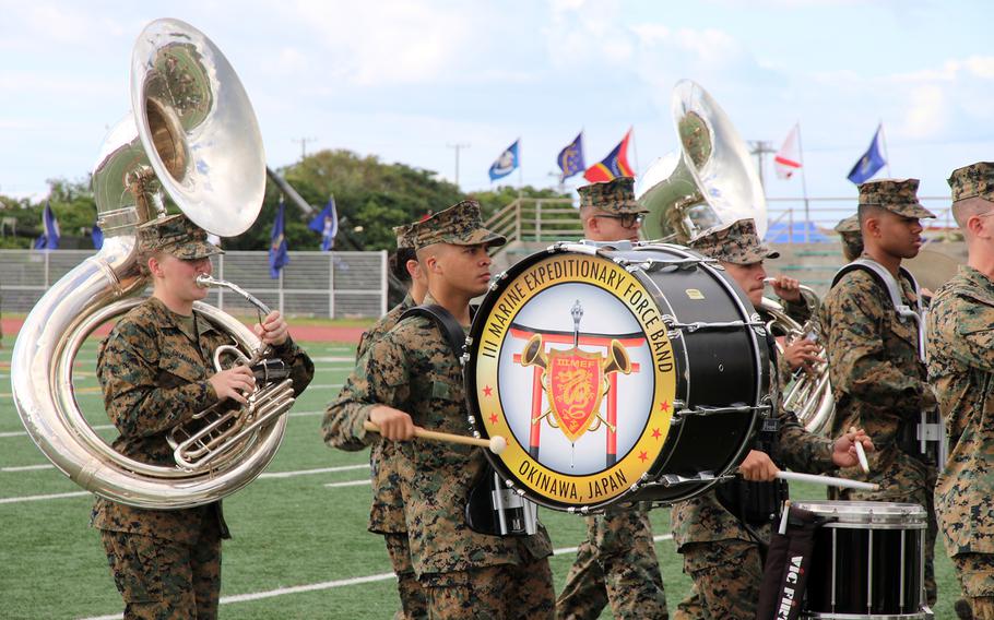 The III Marine Expeditionary Force Band serenades attendees at a ceremony launching the new 12th Marine Littoral Regiment at Camp Hansen, Okinawa, Wednesday, Nov. 15, 2023.