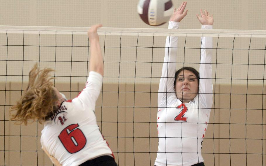 Senior Kathryn Kindt, right, and the E.J. King Cobras have gone 14-0 and have not dropped a set so far this season.
