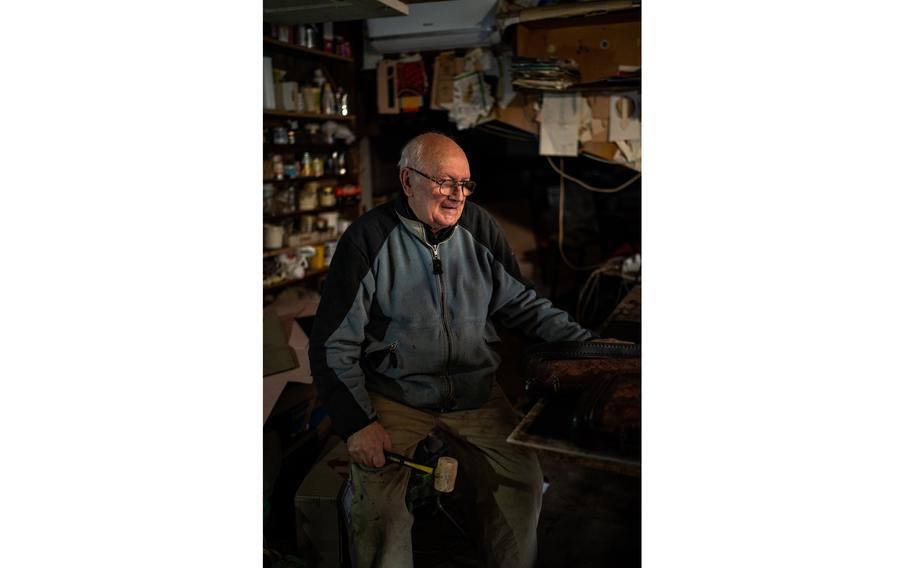 Evgeny Petrov, 75, inside his shop at his home in Odesa, Ukraine, on March 6, 2022. Petrov is a leather craftsman. 