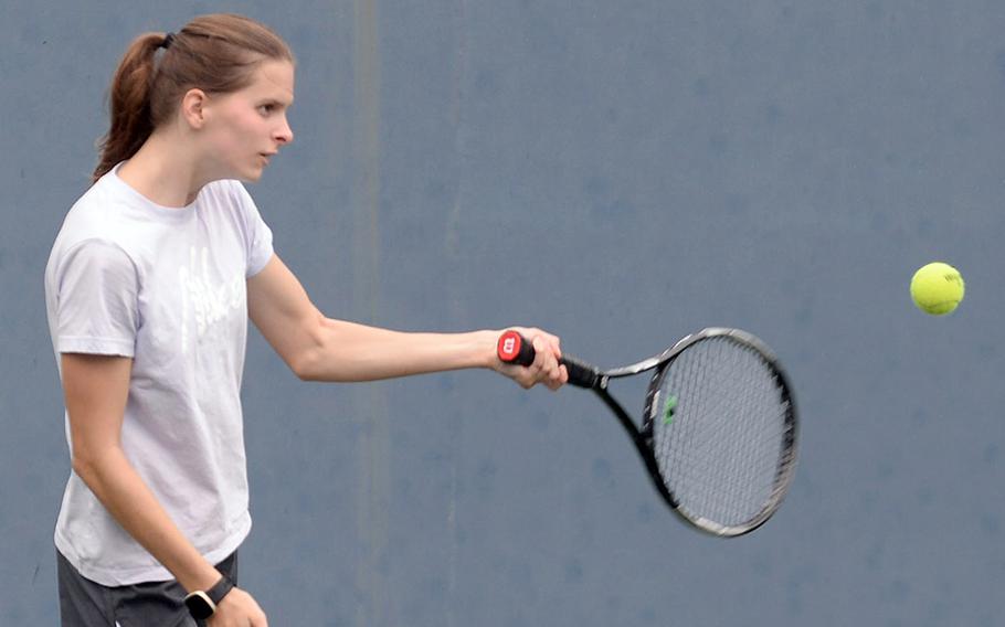 Senior Emma Sims went unbeaten on the DODEA-Korea tennis circuit last season; she and her twin sister Ella return to the courts, while their younger sister, sophomore Ava, plays golf for Daegu.