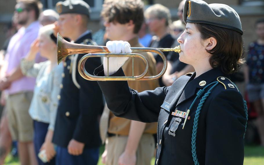 Staff Sgt. Deven Huwig plays Taps during a 10th anniversary memorial service for Marines Sgt. Daniel Patron in Perry Township on Saturday, Aug. 21, 2021. Patron died Aug. 6, 2011, while defusing a roadside bomb while serving in Afghanistan.