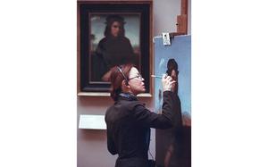 Paris, France, November 1998: An artist copies one of the masters at the Louvre museum in Paris.

Looking for a weekend get away or what to do in your neck of the European woods? Check out Stripes Europe community pages, [https://europe.stripes.com/], or peruse your local What's Up magazine! [https://ww2.stripes.com/epaper/special-publications/whats-up]

META TAGS: Europe; travel; military life; military community; leisure; art; museum