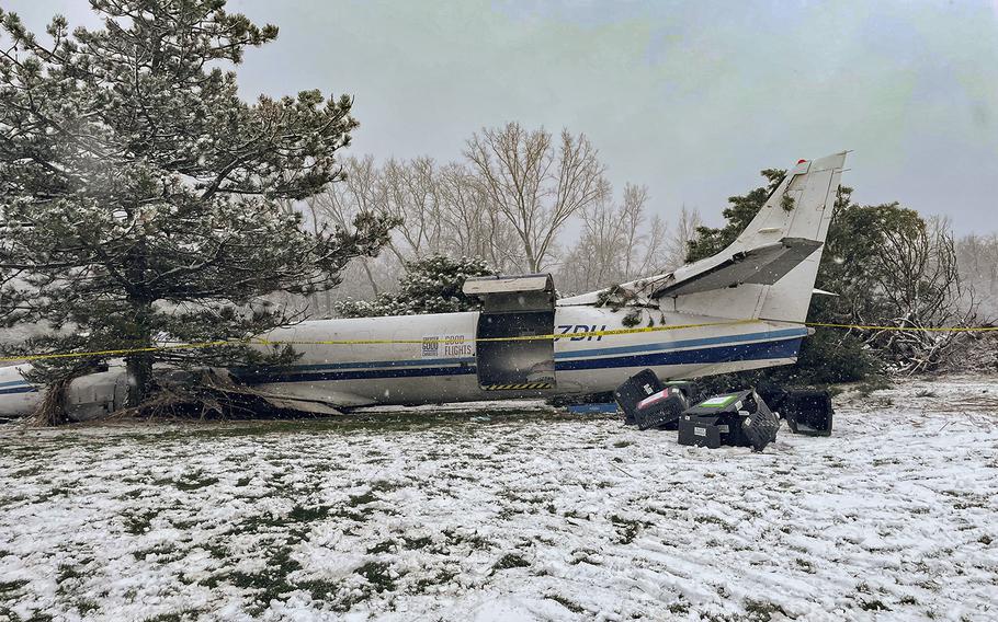 A turboprop plane that crash-landed on a golf course in Pewaukee, Wis., while transporting 53 rescue dogs from New Orleans on Tuesday, Nov. 15, 2022.