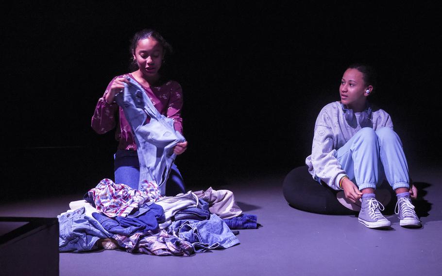 Yokota Middle School students Aliyahna Showers, left, and Saniah Howell rehease “NC’s Big Night” inside a black-box theater at Yokota Air Base, Japan, Jan. 3, 2023. 