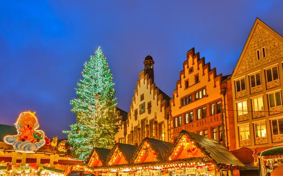 The Roemerberg and its traditional Christmas market in the historic center of Frankfurt always boasts a tall and well-lit tree.