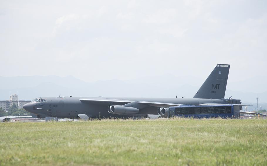 A B-52 Stratofortress bomber parks at Yokota Air Base, Japan, Wednesday, July 12, 2023. 