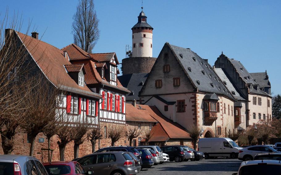 A view of half-timbered houses, left, and the castle of the princes of Ysenburg-Buedingen in Buedingen, Germany. It has been in family hands for more than 20 generations. 