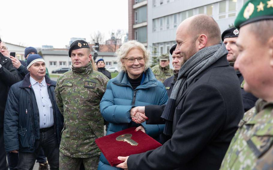 German Defense Minister Christine Lambrecht presents a symbolic key marking the first of 15 planned deliveries of Leopard 2A4 tanks to Slovakia on Dec. 20, 2022. Despite increased defense spending, Germany still falls far short of the 2% of gross domestic product spending goal for NATO member countries.