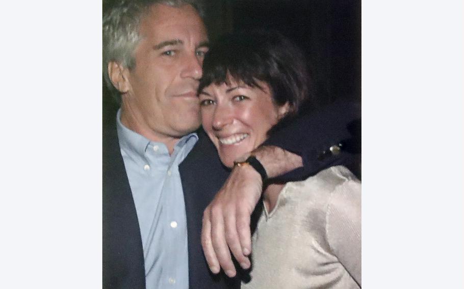 A picture of Ghislaine Maxwell and Jeffrey Epstein is displayed on July 2, 2020 in New York during a briefing by the acting U.S. attorney for the Southern District of New York. Maxwell should spend at least 30 years in prison for her role in the sexual abuse of teenage girls over a 10-year period by her onetime boyfriend, financier Jeffrey Epstein, prosecutors said Wednesday, June 23, 2022, in written arguments. 