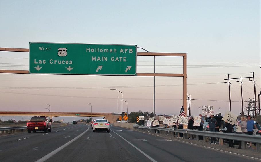 People outside Holloman Air Force Base on Sept. 13, 2021, protest military vaccine mandates.