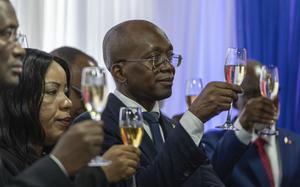 Michel Patrick Boisvert, who was named interim Prime Minister by the cabinet of outgoing Prime Minister Ariel Henry, toasts during the swearing-in ceremony of the transitional council in Port-au-Prince, Haiti, on April 25, 2024.