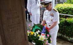 The commander of Naval Forces Japan, Rear Adm. Carl Lahti, lays a wreath during a memorial service at Gyokusenji Temple in Shimoda, Japan, May 19, 2023. The service was part of the city's 84th annual Black Ship Festival.