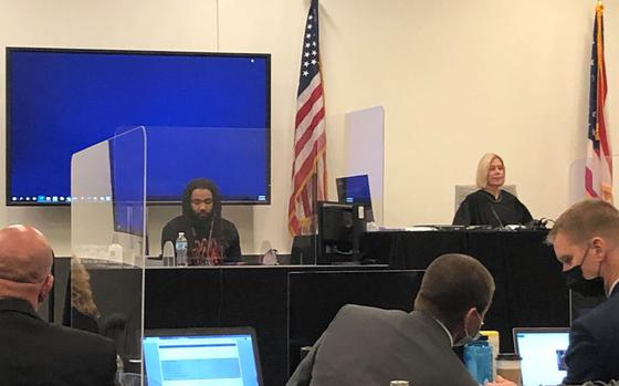 Macquise Lewis testifies during the trial of Fort Stewart soldier Tevin Biles-Thomas, who is charged with murder, manslaughter and other charges in a New Year’s Eve 2018 shooting that left three people dead.
