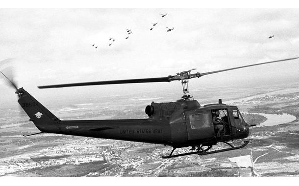 May, 1965: U.S. Army helicopters carry troops over the Vietnamese countryside near Binh Hoa. 