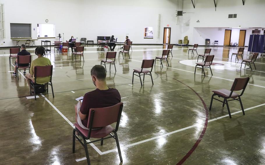 People sitting in the waiting area after receiving their monkeypox vaccine at the Dr. Ala Stanford Center for Health Equity in North Philadelphia on Aug. 31, 2022. 