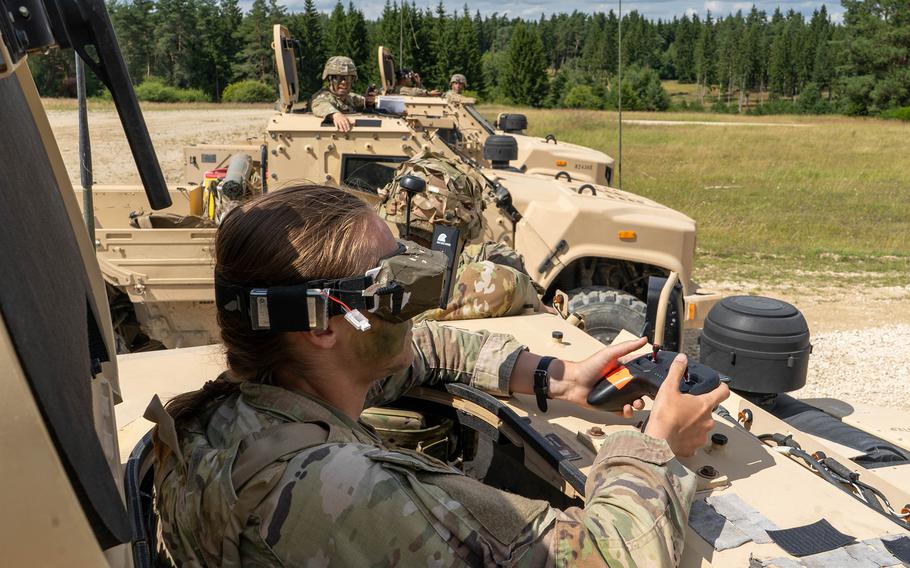 A soldier with his remote control in hand.
