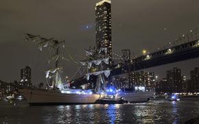 A masted Mexican navy training ship, the Cuauhtemoc, sits stranded after colliding with the Brooklyn Bridge.