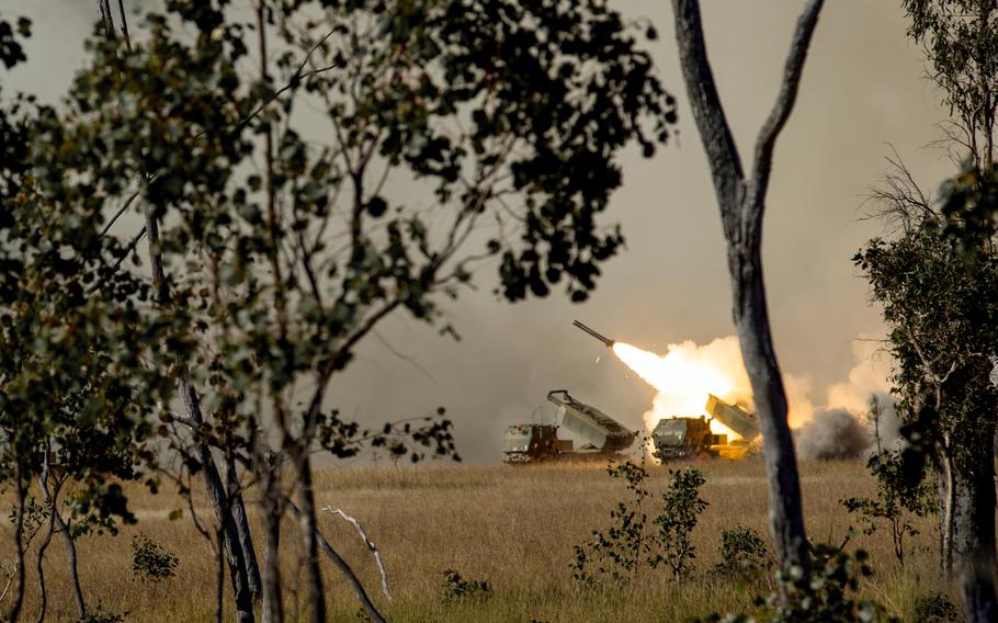 U.S. Marines and soldiers fire High Mobility Artillery Rocket Systems during the Talisman Sabre exercise at Shoalwater Bay Training Area in Queensland, Australia, July 18, 2021.