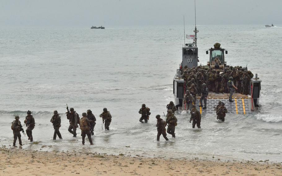 U.S. Marines are ferried ashore at Kings Beach near Bowen, Australia, during the Talisman Sabre exercise, July 22, 2019. 