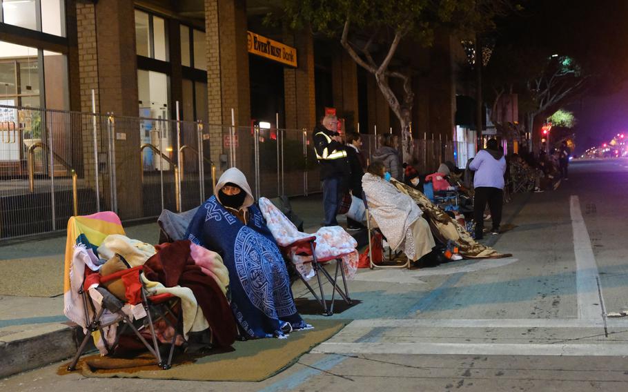 The few camped out on the parade route on Colorado Blvd. before the 133rd Rose Parade in Pasadena, Calif., on Saturday, Jan. 1, 2022. 