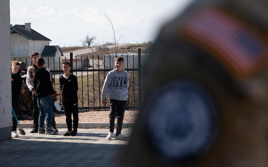 U.S. soldiers visit a school in Ferizaj, Kosovo, on Feb. 22, 2024. A quarter-century after NATO launched a bombing campaign to stop the ethnic cleansing of Albanians in Kosovo, international peacekeeping troops remain on the ground and the security situation remains fragile. 