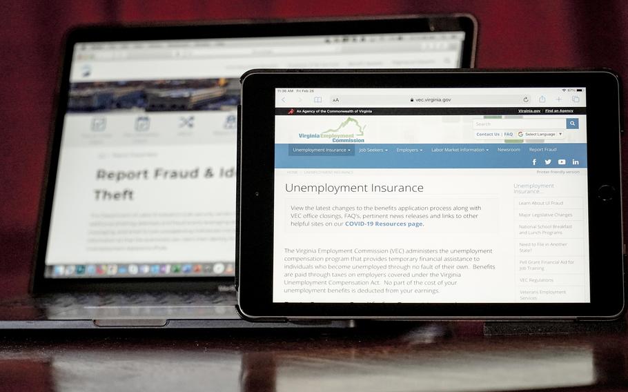 Web pages used to show information for collecting unemployment insurance in Virginia, right, and reporting fraud and identity theft in Pennsylvania, are displayed on the respective state web pages, on Feb. 26, 2021, in Zelienople, Pa. The Secret Service said it has seized more than $1.2 billion while investigating unemployment insurance and loan fraud and has returned more than $2.3 billion of fraudulently obtained funds by working with financial partners and states to reverse transactions.  