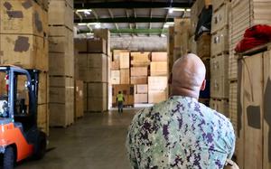 Naval Supply Systems Command (NAVSUP) Fleet Logistics Center (FLC) Pearl Harbor Commanding Officer (CO) Captain Sean Andrews, SC, USN tours household goods (HHG) local agent in Honolulu, Hawaii in support of PCS peak season preparedness.  NAVSUP FLC Pearl Harbor Supports PCS Peak Season Preparedness