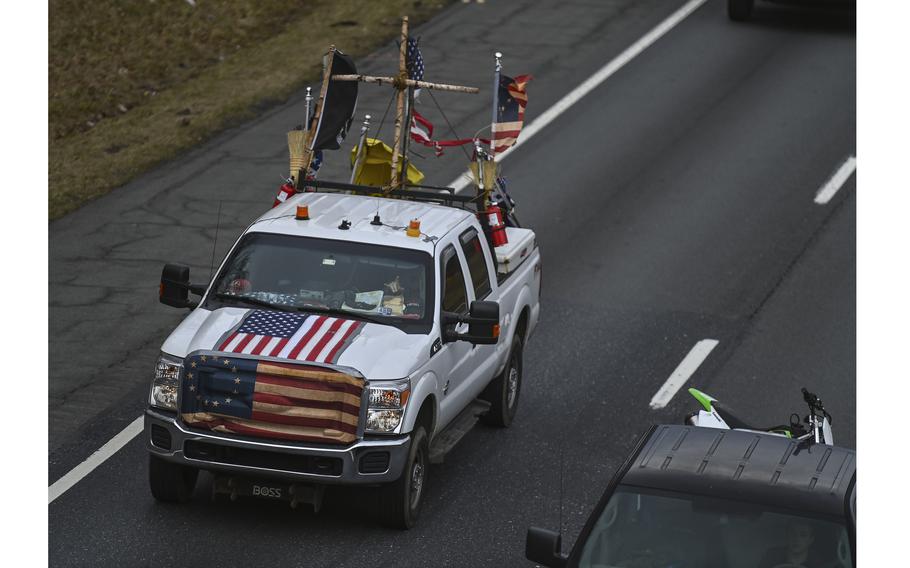 Participants in the Freedom Convoy travel east on Interstate 70 on Monday, March 7, 2022, in Myersville, Md. 