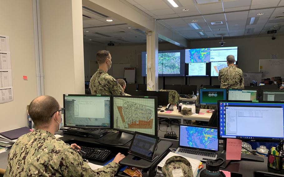 Naval Air Station Sigonella personnel at the base's emergency command center keep watch on weather, flooding and other potential issues, Oct. 29, 2021. A cyclonic storm brought 20 inches of rain in about 36 hours to the Catania, Sicily area near the base earlier in the week, causing significant flooding. A return of the storm on Friday brought lighter rain, much to the relief of residents and officials. 