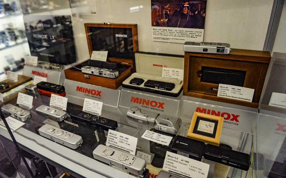 A collection of Minox pocket cameras on display at 3F German Film and Photo Technology Museum in Deidesheim, Germany, on Dec. 2, 2021. Minox cameras were considered revolutionary because of their small size and were featured prominently in Cold War-era action movies as a tool of spycraft.