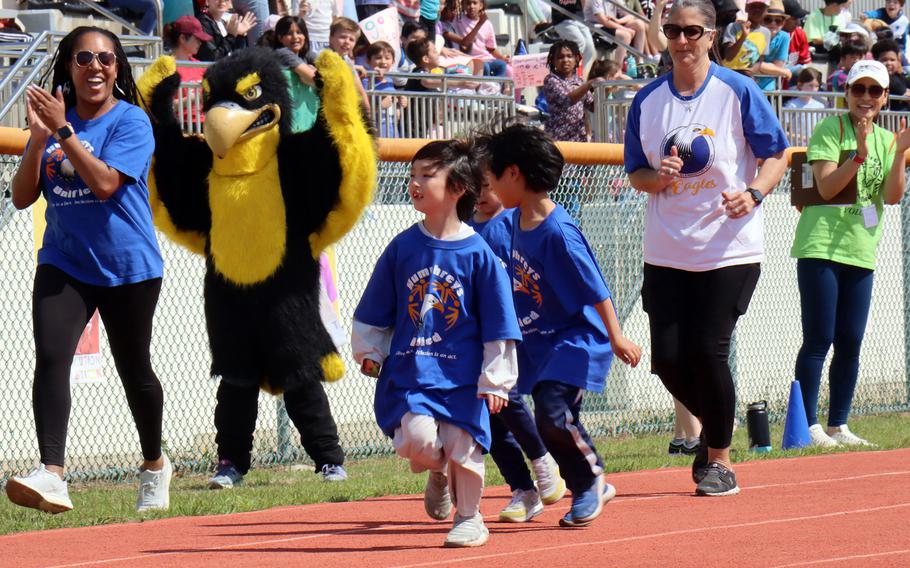 Student-athletes race toward the 25-meter finish line during the Unified Special Olympics at Camp Humphreys, South Korea, May 3, 2023.