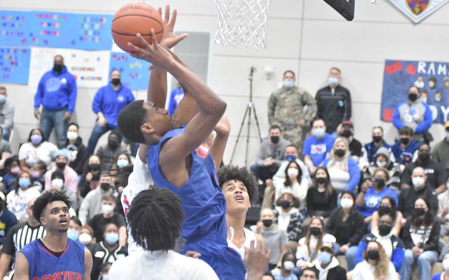 Ramstein's Bryson Bishop goes up for a basket late in the championship game of the DODEA-Europe Division I boys basketball championships on Saturday, Feb. 26, 2022 at Ramstein High School. The Royals defeated Kaiserslautern for the title.