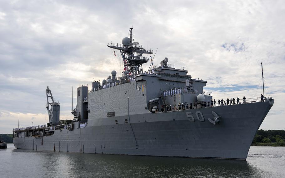 The dock landing ship USS Carter Hall (LSD 50) pulls away from the pier at Joint Expeditionary Base Little Creek/Fort Story for a scheduled deployment on Monday, July 10, 2023. 