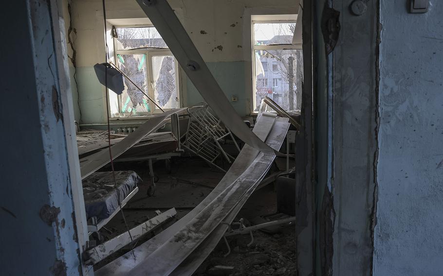 A crib in one of the rooms of a destroyed hospital maternity ward in Vilnyansk, Ukraine, on Nov. 23, 2022. 