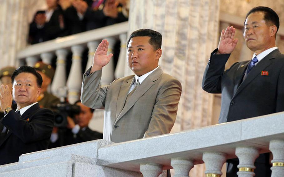 This image from the state-run Korean Central News Agency shows North Korean leader Kim Jong Un attending a military parade in Pyongyang, Sept. 9, 2021. 