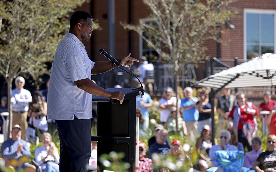 Republican U.S. Senate candidate Herschel Walker speaks during a campaign event Tuesday in Canton, where he focused on transgender athletes who compete in sports that don&apos;t match their gender at birth. “They’re trying to tell you right now that this is normal,&quot; Walker said. &quot;But I’m here to tell you this is not normal.” 