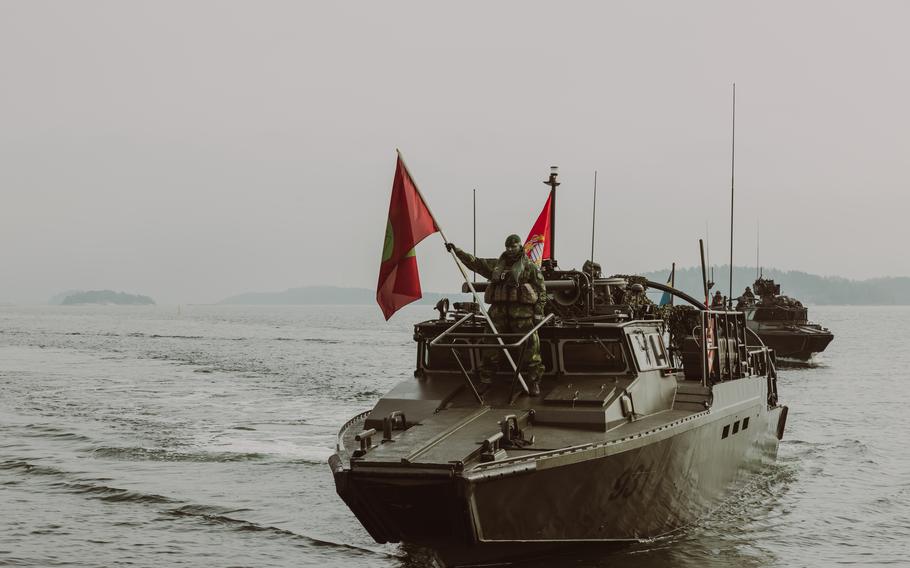 Swedish marines aboard a Combat Boat 90 pull up to a pier during Exercise Archipelago Endeavor 23 in Sweden on Sept. 12, 2023. The Swedish armed forces led the exercise in cooperation with U.S. Marines.