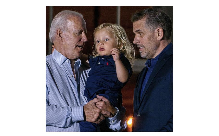 President Biden with his son Hunter and grandson Beau are seen during the 2022 Independence Day celebration at the White House. 