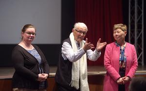 German filmmakers Kerstin Schmidt, left, and Thilo Pohle answer questions from the audience after screening their World War II documentary "And Now Show that You are One People!" at U.S. Army Garrison Ansbach, Germany, on April 25, 2025. The film was shown at the base's Bismarck Movie Theater to commemorate the 80th anniversary of Ansbach's liberation from the Nazis on April 19, 1945.