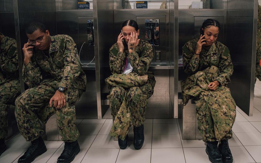 Recruits call home during their scheduled divisional phone calls at Recruit Training Command in December 2023. Boot camp is approximately 10 weeks, and all enlistees into the U.S. Navy begin their careers at the command. 