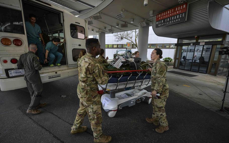 U.S. Air Force and Army medical technicians transport a medical simulation mannequin during a patient evacuation training scenario at Landstuhl Regional Medical Center in Germany on May 10, 2023. The Defense Department’s largest hospital overseas, LRMC has treated Americans injured in the Russia-Ukraine war, including a Fox News correspondent and Marine veteran Trevor Reed.