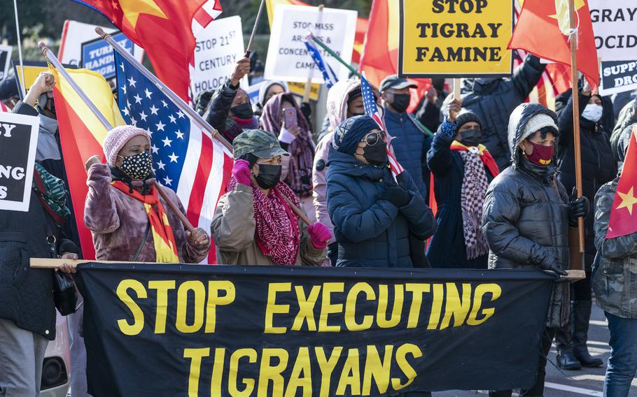 A group from the Tigrayan diaspora in North America protest near the State Department in Washington on Dec. 22, 2021, about the conflict in Ethiopia. A Human Rights Watch report said Wednesday, Jan. 5, 2022, that officials in Ethiopia have arbitrarily detained and forcibly disappeared thousands of ethnic Tigrayans who recently were deported from Saudi Arabia.