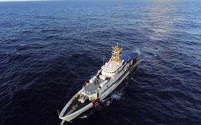 The crew of the U.S. Coast Guard cutter Myrtle Hazard patrols the Philippine Sea near Guam, March 25, 2025.