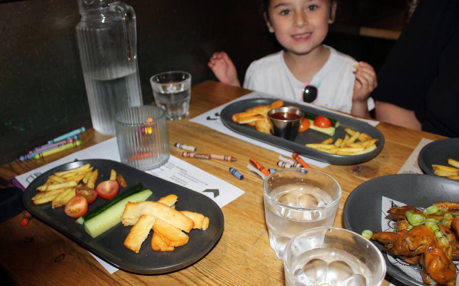 Two orders of a Smoke Works kids meal consisting of halloumi, fries and vegetable sticks. Kids meals at the barbecue restaurant allow for selection of a main dish with sides and come with a complimentary dessert.