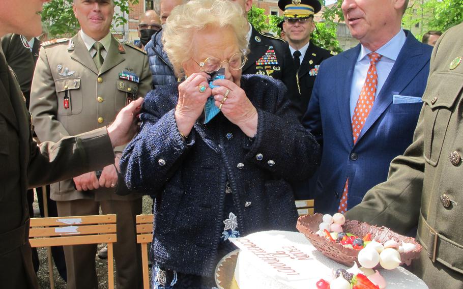 Meri Mion of Vicenza, who was 13 on the day 77 years ago when U.S. soldiers arrived in the city, liberated it from the Germans and then took her birthday cake, cried when the cake was replaced by U.S. Army Garrison Italy at a ceremony, April 28, 2022. 