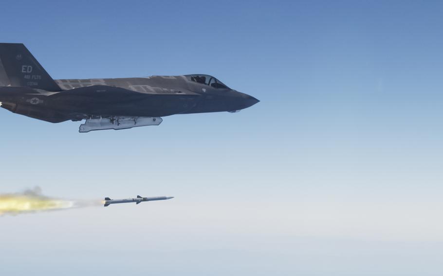 An F-35 Lightning II launches an AIM-120 advanced medium range air-to-air missile over a test range off the California coast in 2013. The United States approved the sale of AIM-120 missiles to Romania and Norway as both nations work to meet NATO's 2% defense spending target.