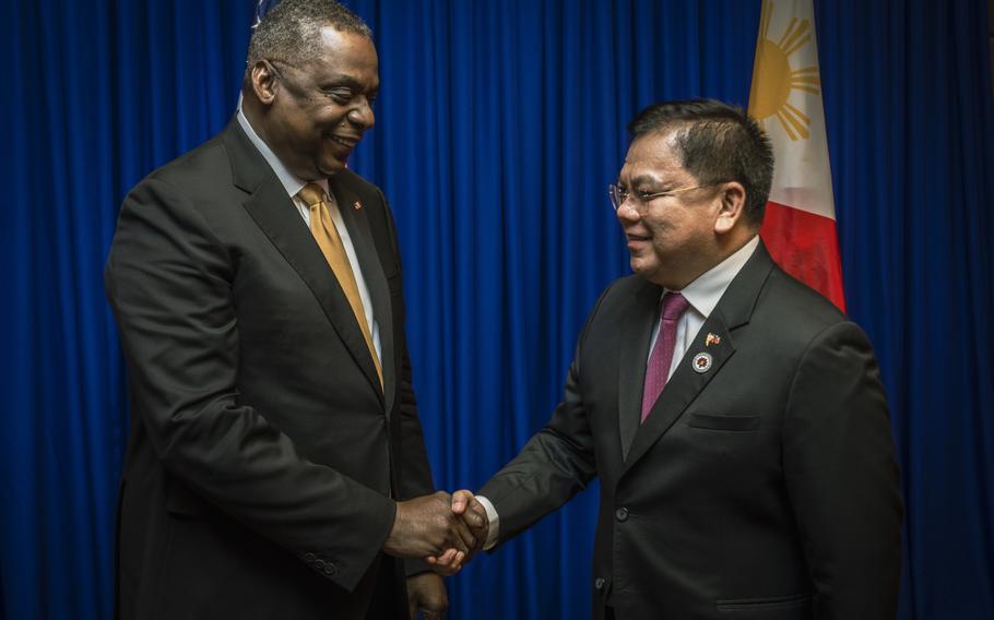 Secretary of Defense Lloyd J. Austin III greets Jose Faustino Jr., then-Secretary of National Defense of Philippines at the 9th Association of Southeast Asia Nations Defense Ministers (ASEAN) Meeting-Plus in Siem Reap, Cambodia, Nov. 22, 2022. The U.S. military is poised to secure expanded access to key bases in the Philippines on the heels of a significant revamp of U.S. force posture in Japan.