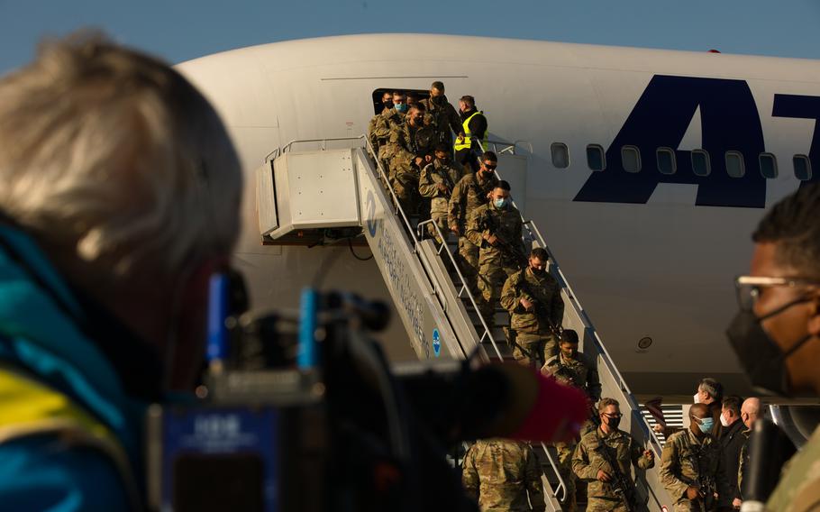Army soldiers from the 3rd Infantry Division at Fort Stewart, Ga, arrive at Nuremberg Airport, Nuremberg, Germany, on March 1, 2022. The U.S.-based 1st Armored Brigade Combat Team is deploying to Europe and will be located at Grafenwoehr Training Area, where they will be issued equipment from Army Prepositioned Stocks-2, and conduct training. 